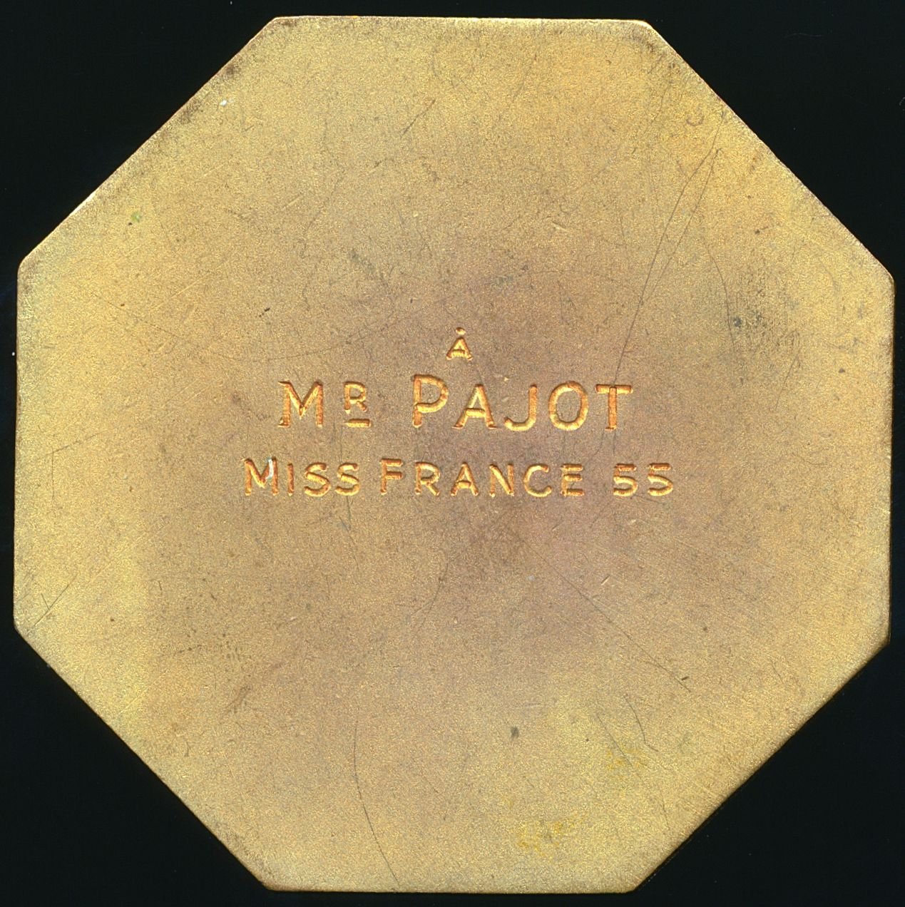 1955 FRANCE Beauty: an Art Deco 52mm octagonal gilt bronze medal presented to “Miss France” l by Edouard Fraisse